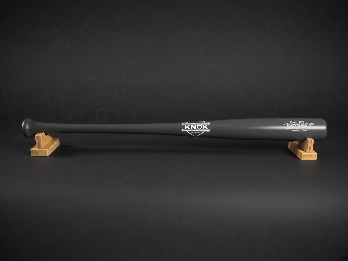 Solid gray maple bat with KNOK logo